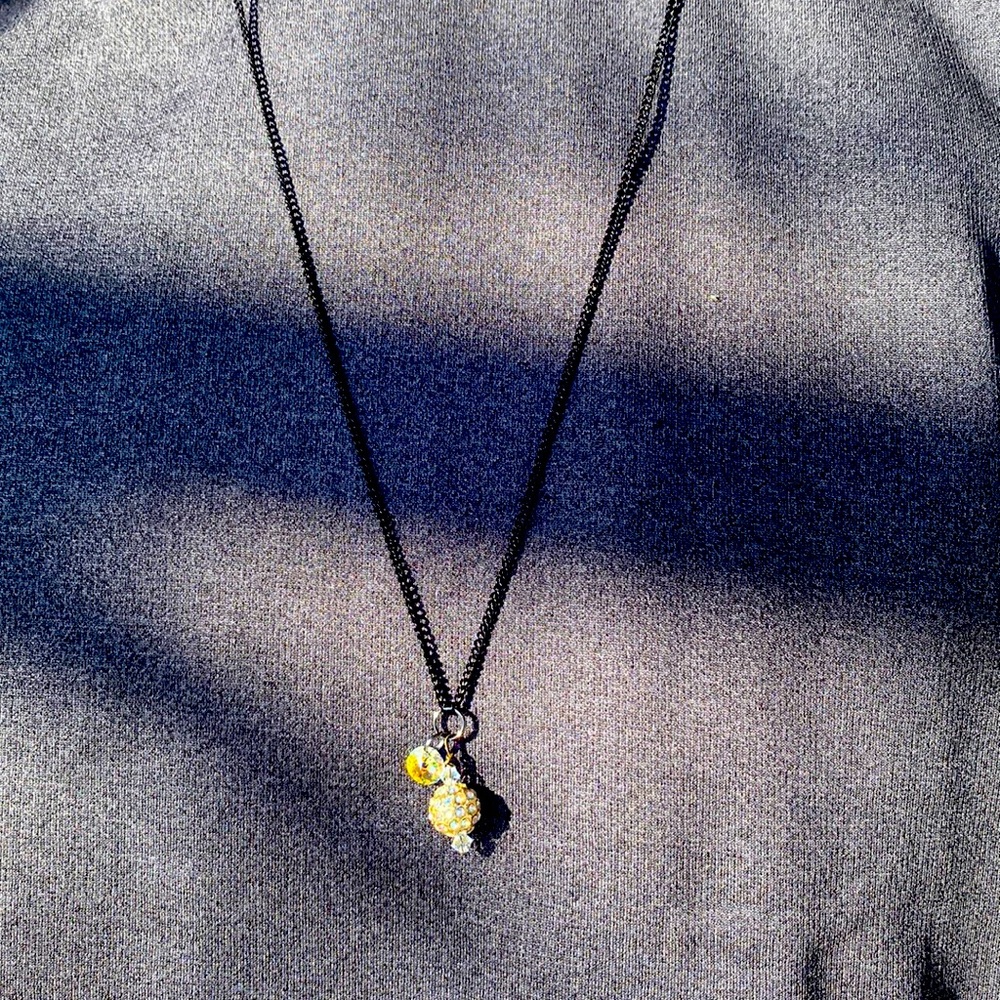 Swarovski crystal/gold sparkle ball necklace.